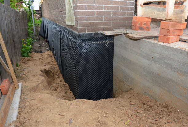 SJ Waterproofing Pros technician performing targeted Waterproofing assessment in Hillside, IL